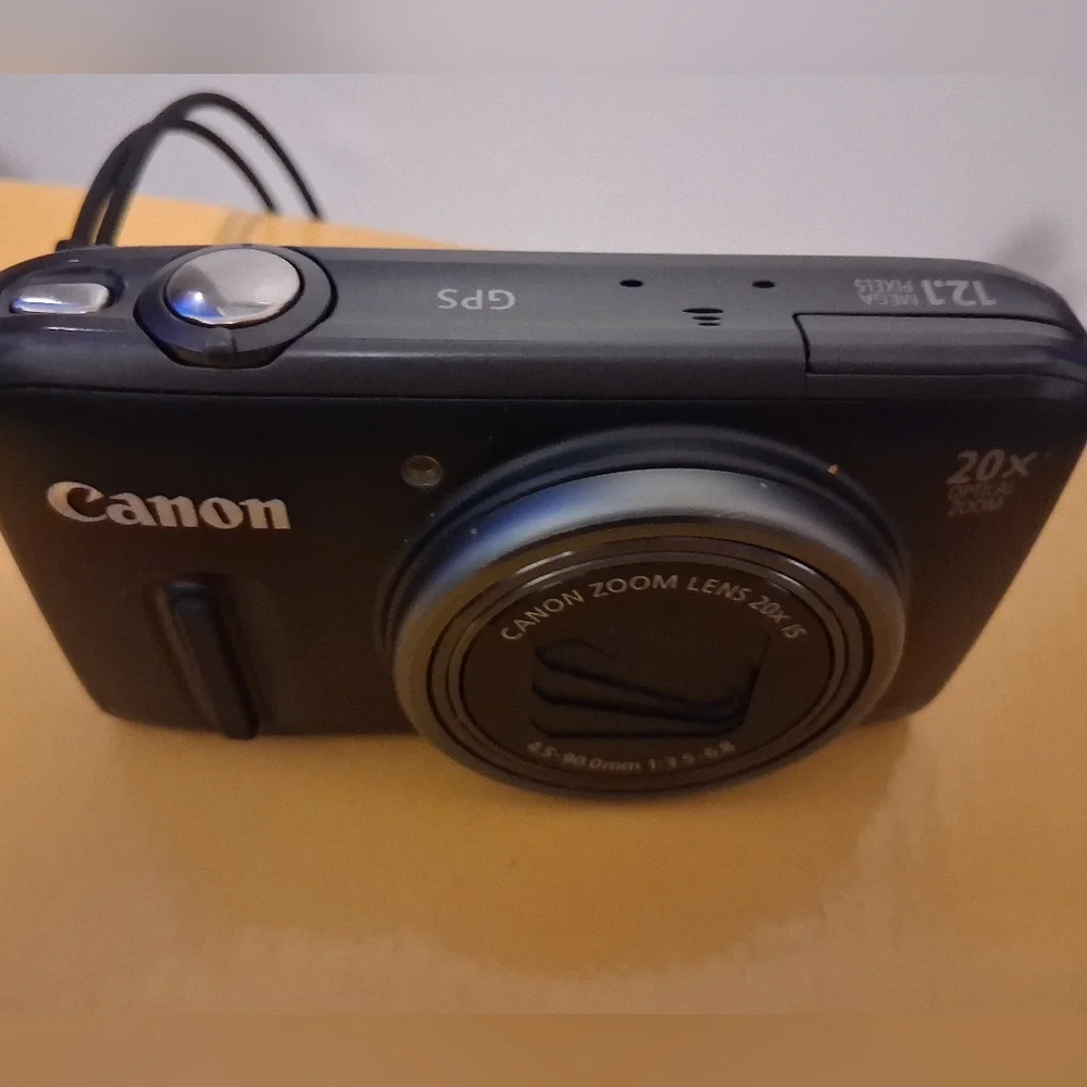 Vintage Canon Black Digital Camera with 20x Optical Zoom